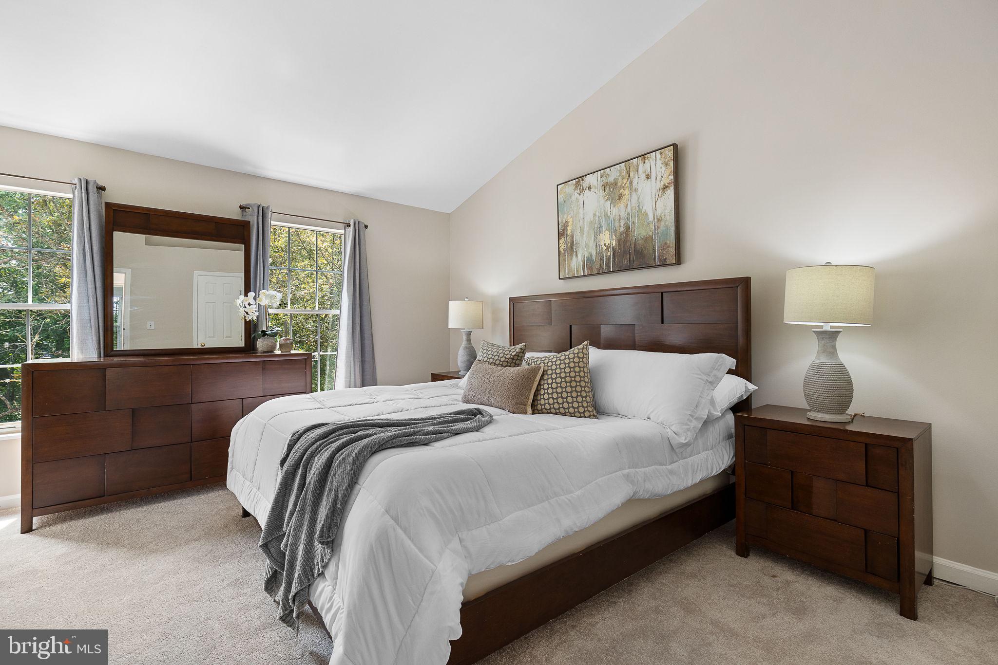 6582 Skylemar Trail Centreville, VA 20121 - Photo 5 of 46 a bedroom with a bed and a night stand