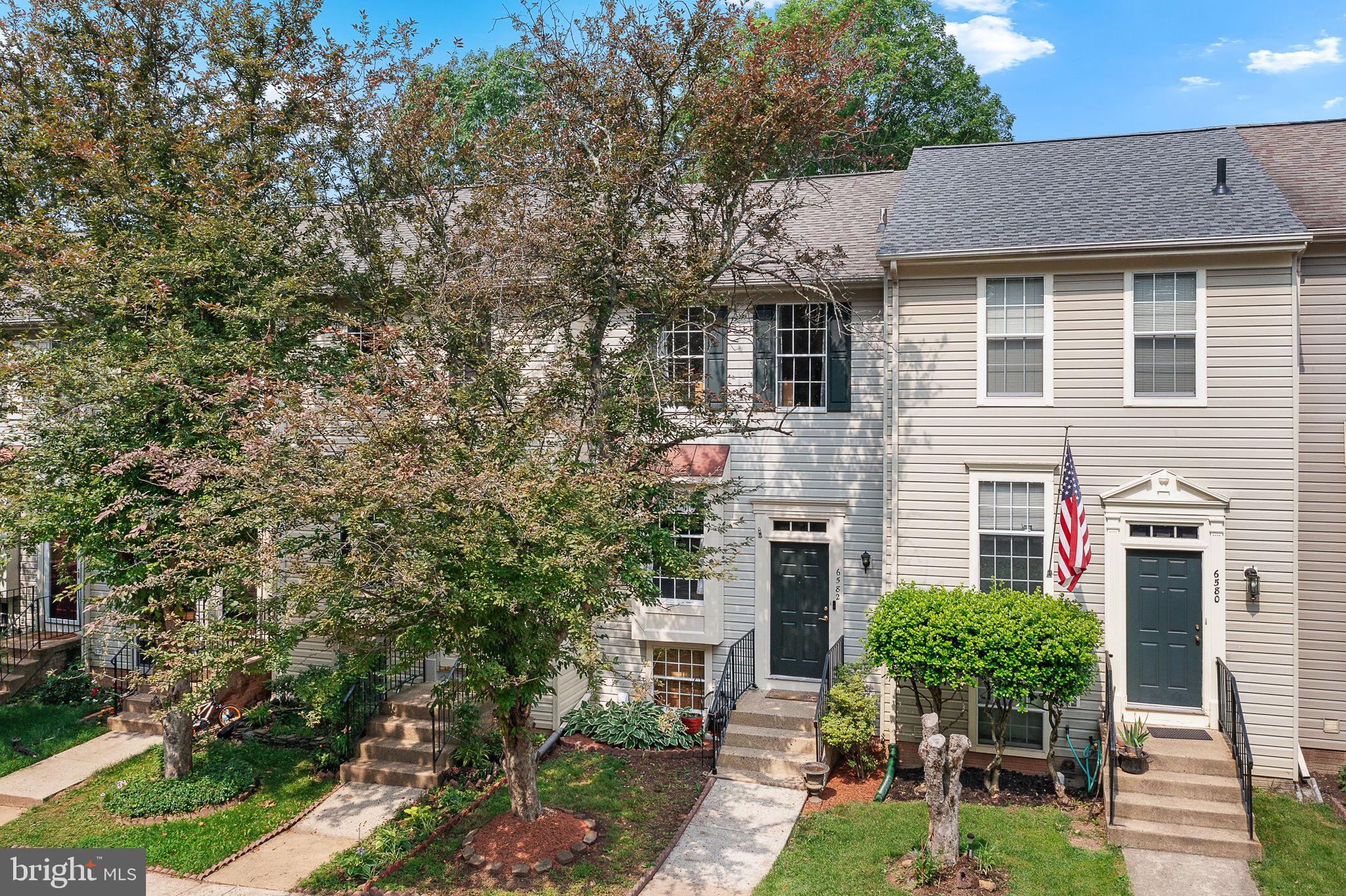 6582 Skylemar Trail Centreville, VA 20121 - Photo 7 of 46 a house view with a garden space