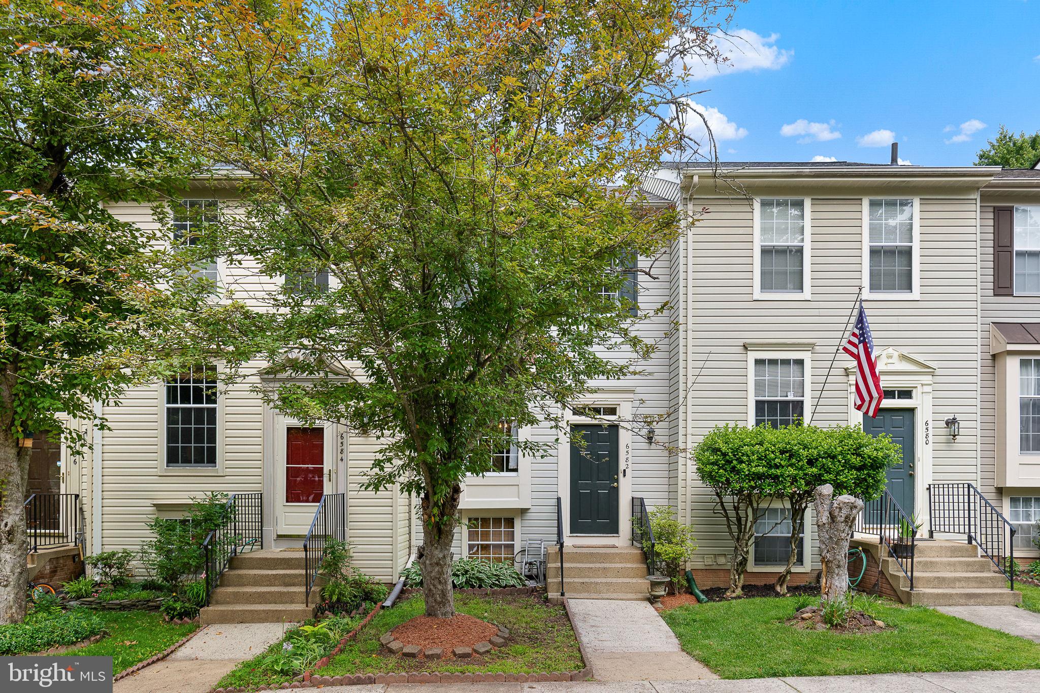 6582 Skylemar Trail Centreville, VA 20121 - Photo 8 of 46 a house that has a tree in front of the house