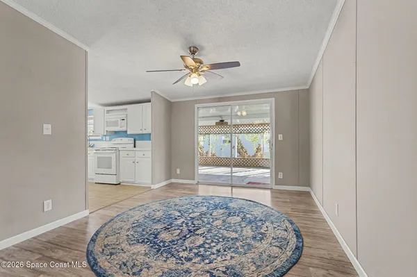 a kitchen with stainless steel appliances a stove refrigerator sink and cabinets
