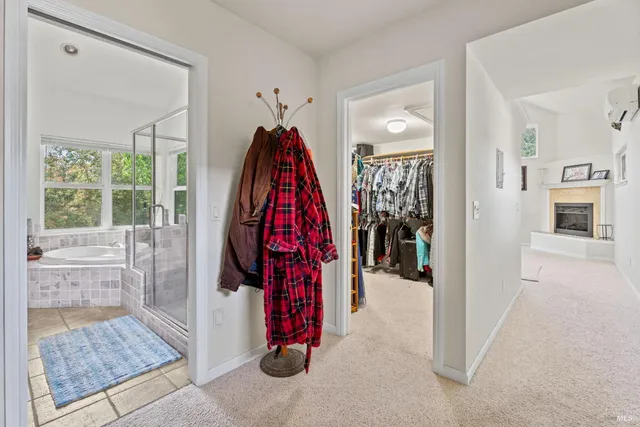 a view of a living room and bathroom