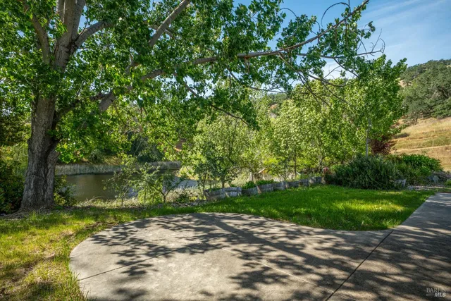 an aerial view of a house with mountain view