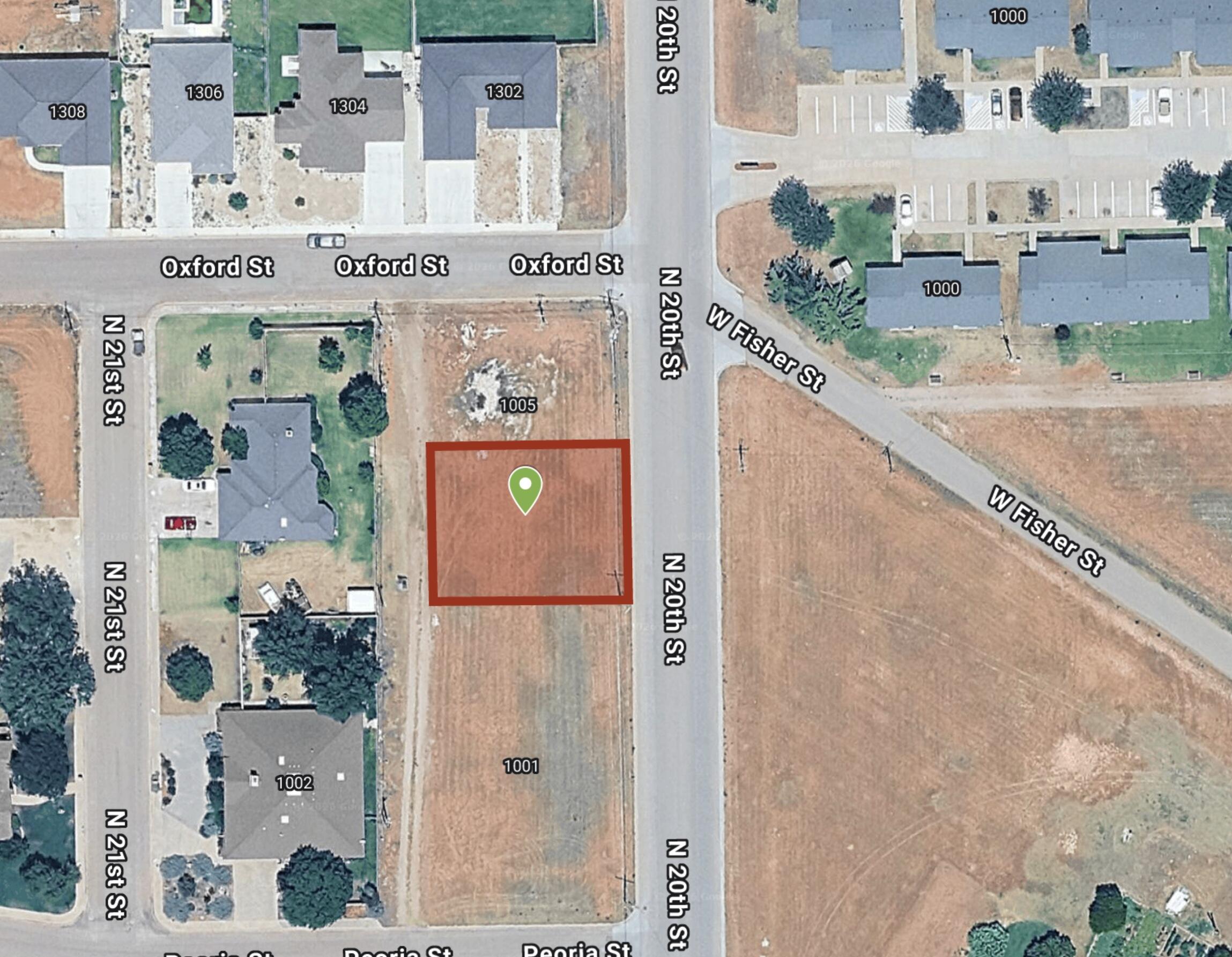 1003 North 20th Street Slaton, TX 79364 - Photo 1 of 2 an aerial view of residential houses with outdoor space