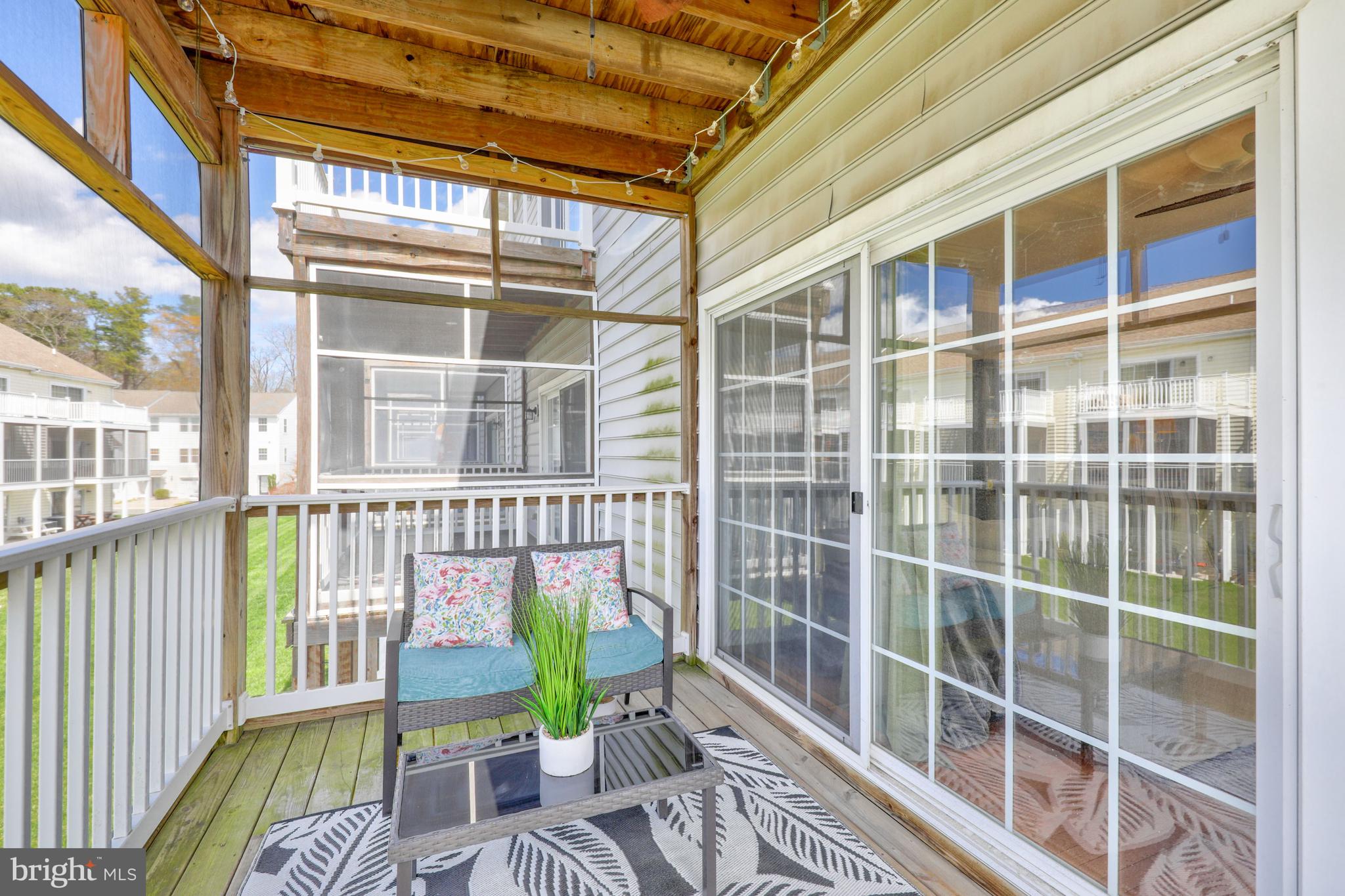 19909 Ames Drive Rehoboth Beach, DE 19971 - Photo 14 of 36 Screened Porch on Main Level