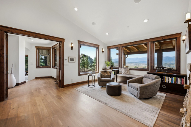 7885 North Rabbitbrush Court, Unit 13 Park City, UT 84098 - Photo 22 of 88 Vaulted ceilings define this inviting space, featuring extensive wood-finish flooring and trim