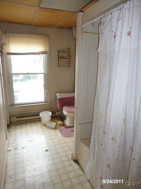 828 West Maple Street Allentown, PA 18101 - Photo 3 of 3 a bathroom with a sink toilet and shower