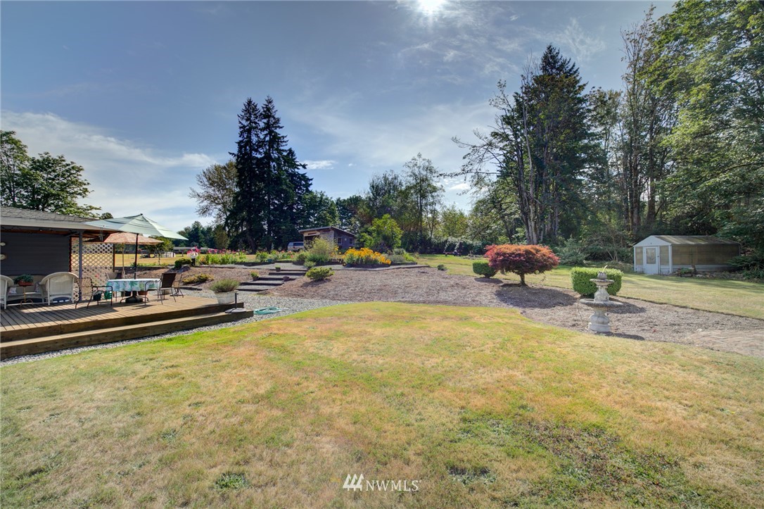 19225 Southeast 141st Street Renton, WA 98059 - Photo 22 of 25 a view of a swimming pool and lounge chair