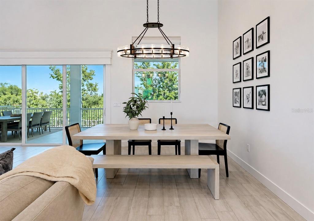 5605 Seagrass Place Apollo Beach, FL 33572 - Photo 25 of 86 a view of a dining room with furniture window and outside view