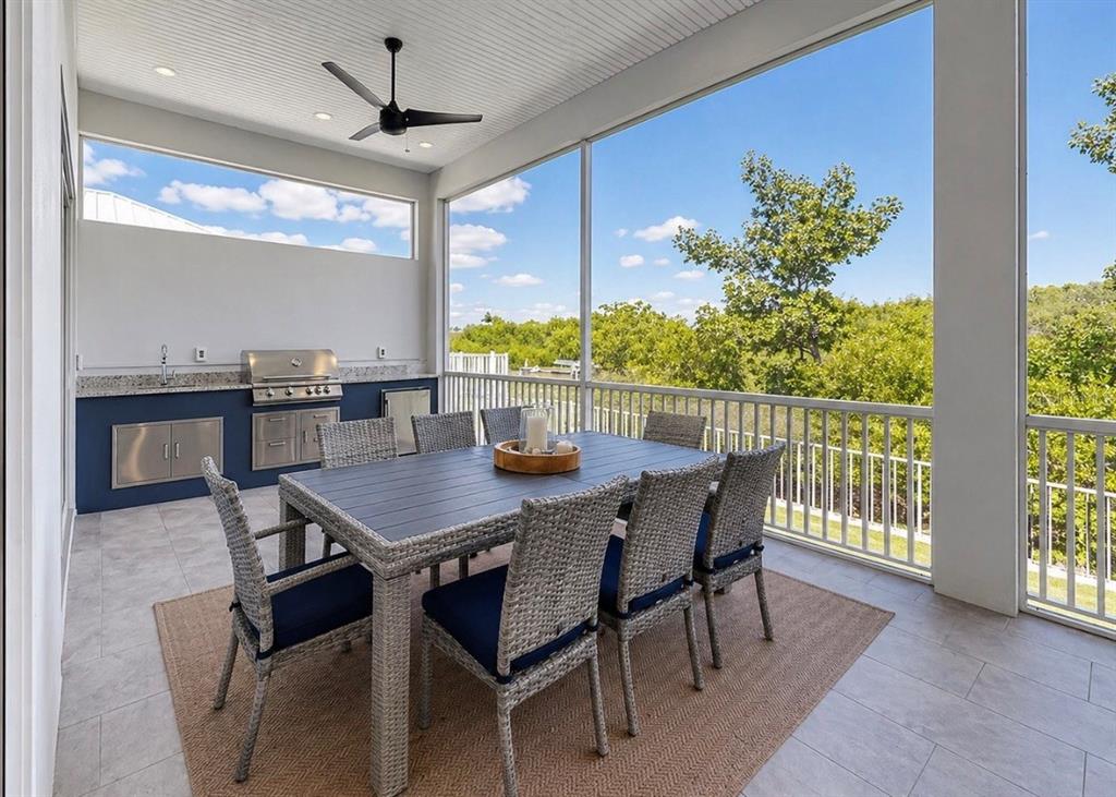 5605 Seagrass Place Apollo Beach, FL 33572 - Photo 51 of 86 a view of a dining room with furniture window and outside view