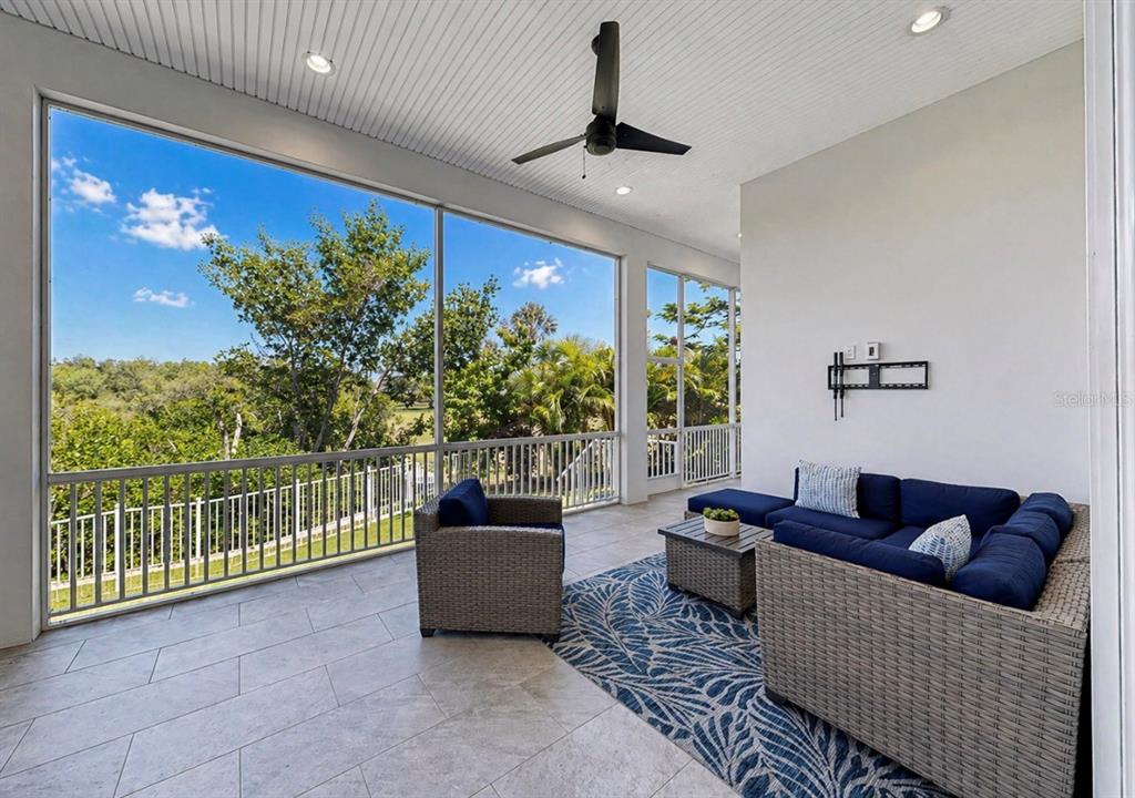 5605 Seagrass Place Apollo Beach, FL 33572 - Photo 52 of 86 a living room with furniture and a potted plant