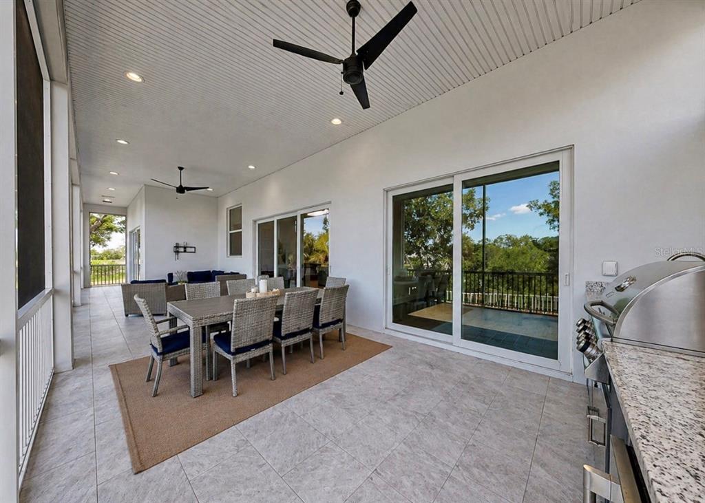 5605 Seagrass Place Apollo Beach, FL 33572 - Photo 59 of 86 a view of a dining room with furniture window and outside view