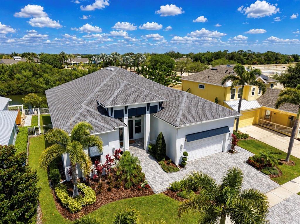 5605 Seagrass Place Apollo Beach, FL 33572 - Photo 64 of 86 an aerial view of a house with a yard