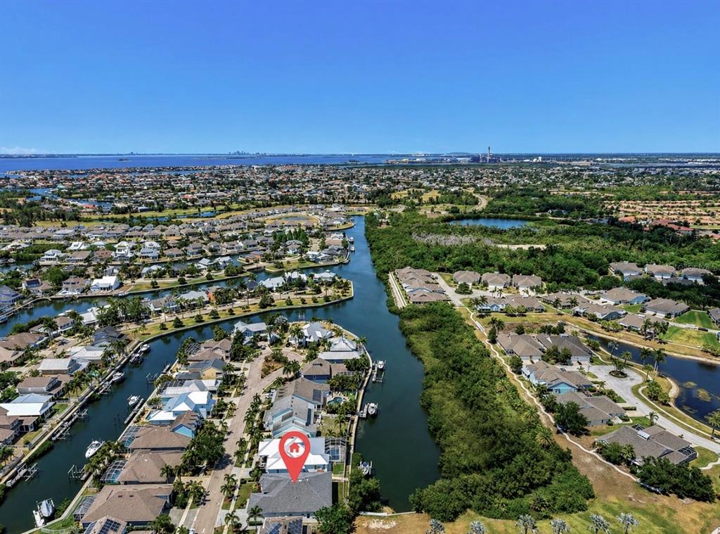 5605 Seagrass Place Apollo Beach, FL 33572 - Photo 68 of 86 an aerial view of a city with lots of residential buildings