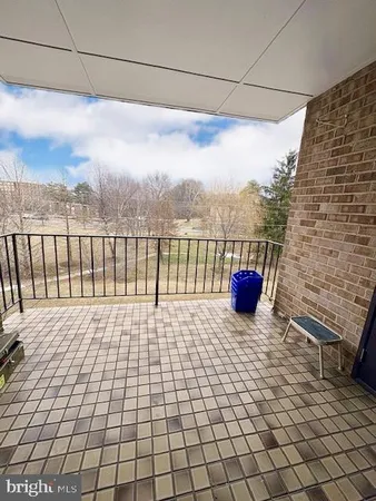 a view of a terrace with a bench