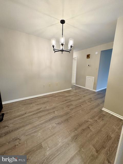 2109 Greenery Lane, Unit 30224 Silver Spring, MD 20906 - Photo 6 of 17 a view of a livingroom with wooden floor