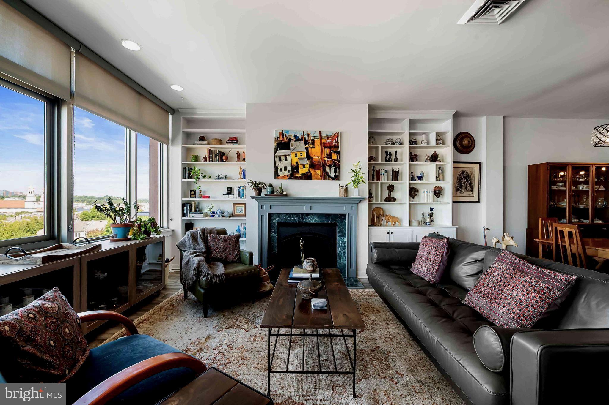 2901 Boston Street, Unit 513 Baltimore, MD 21224 - Photo 1 of 62 a living room with furniture fireplace and rug