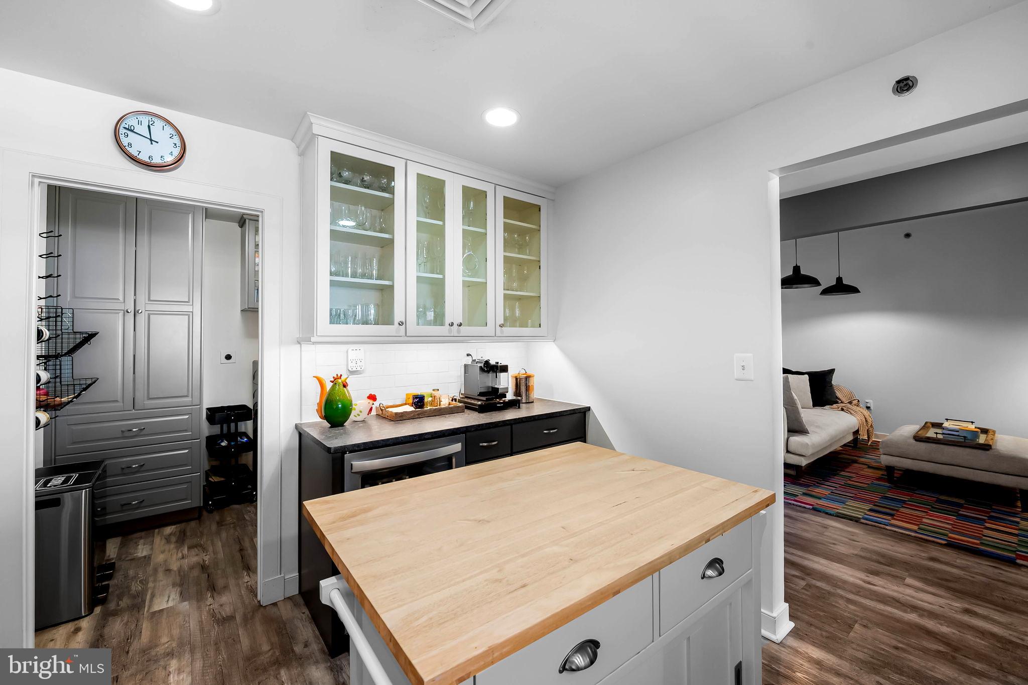 2901 Boston Street, Unit 513 Baltimore, MD 21224 - Photo 19 of 62 a kitchen that has a lot of cabinets in it