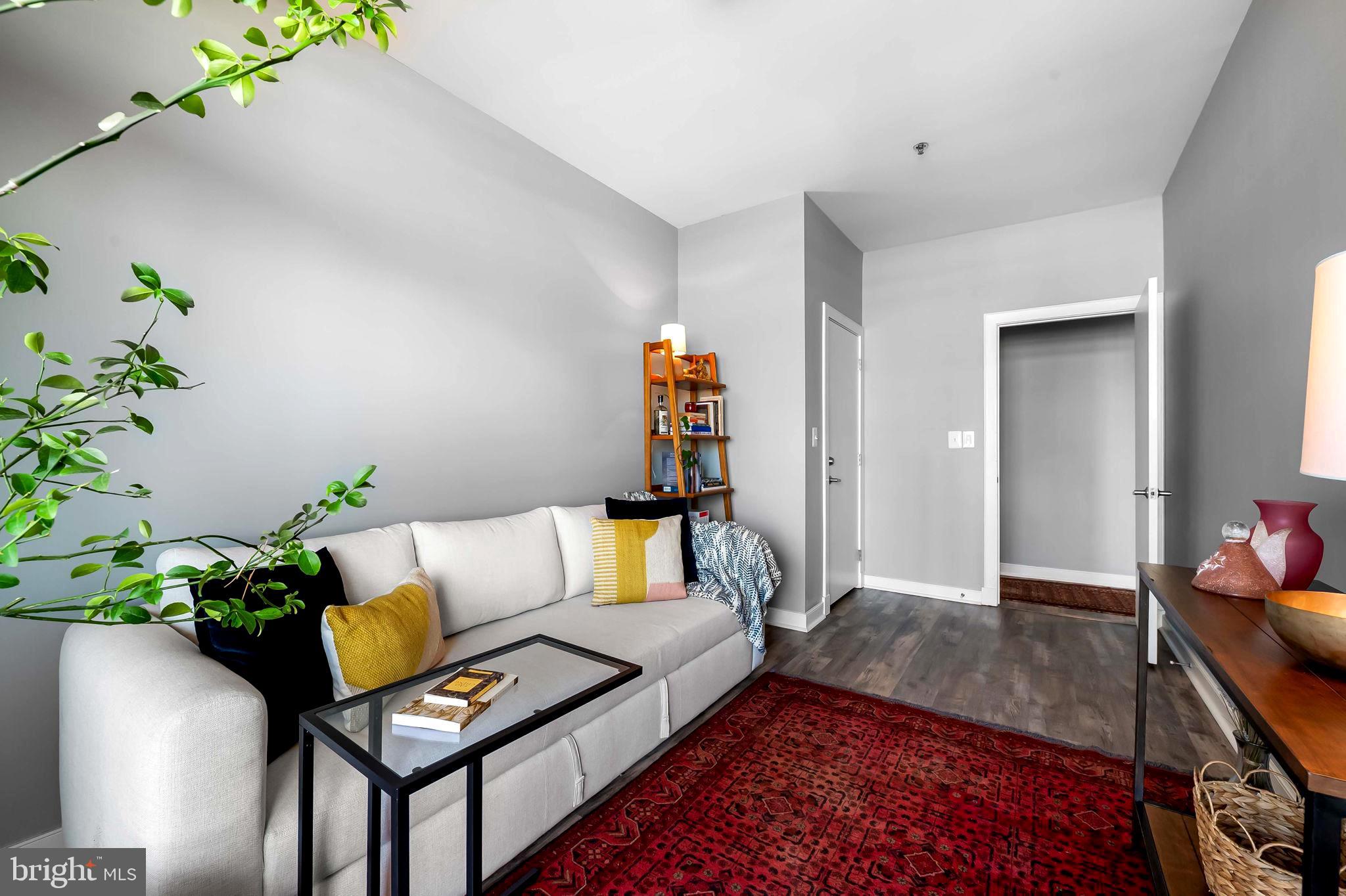 2901 Boston Street, Unit 513 Baltimore, MD 21224 - Photo 23 of 62 a living room with furniture