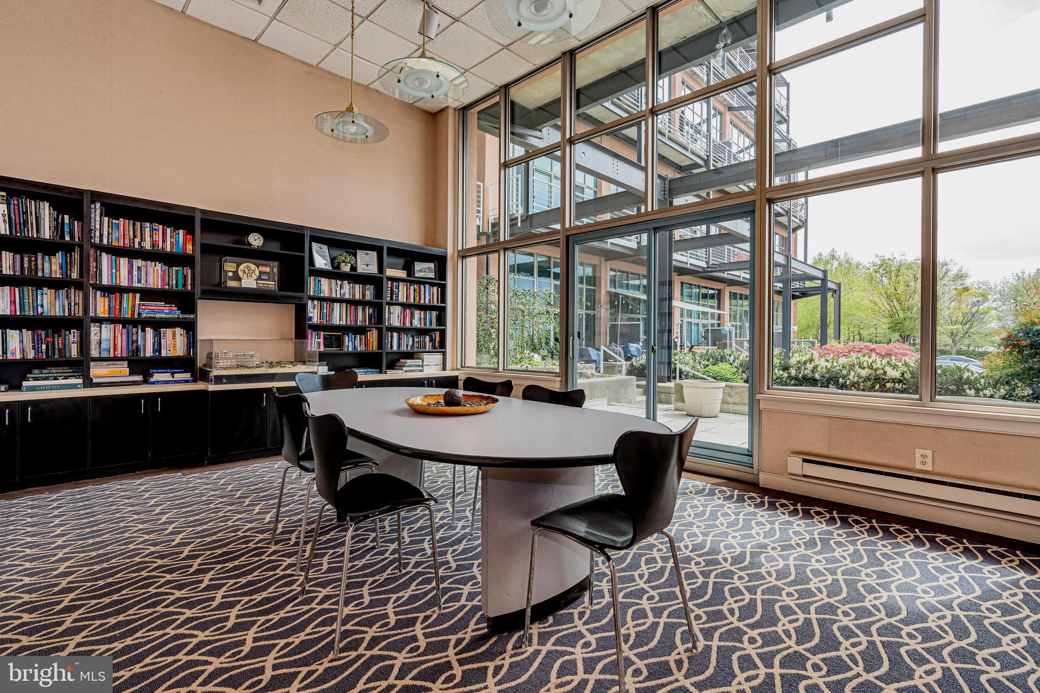 2901 Boston Street, Unit 513 Baltimore, MD 21224 - Photo 41 of 62 a view of a dining room with furniture window and outside view