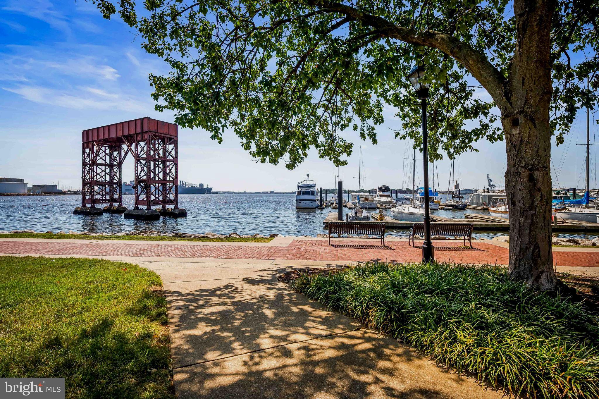 2901 Boston Street, Unit 513 Baltimore, MD 21224 - Photo 57 of 62 a backyard of a house with lots of green space