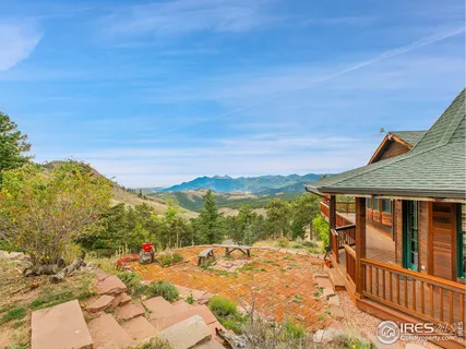 a view of a terrace with a lake view