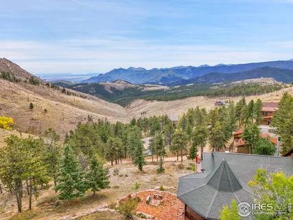 a view of lake and mountain