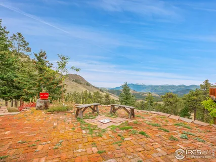 a view of a terrace with a water view