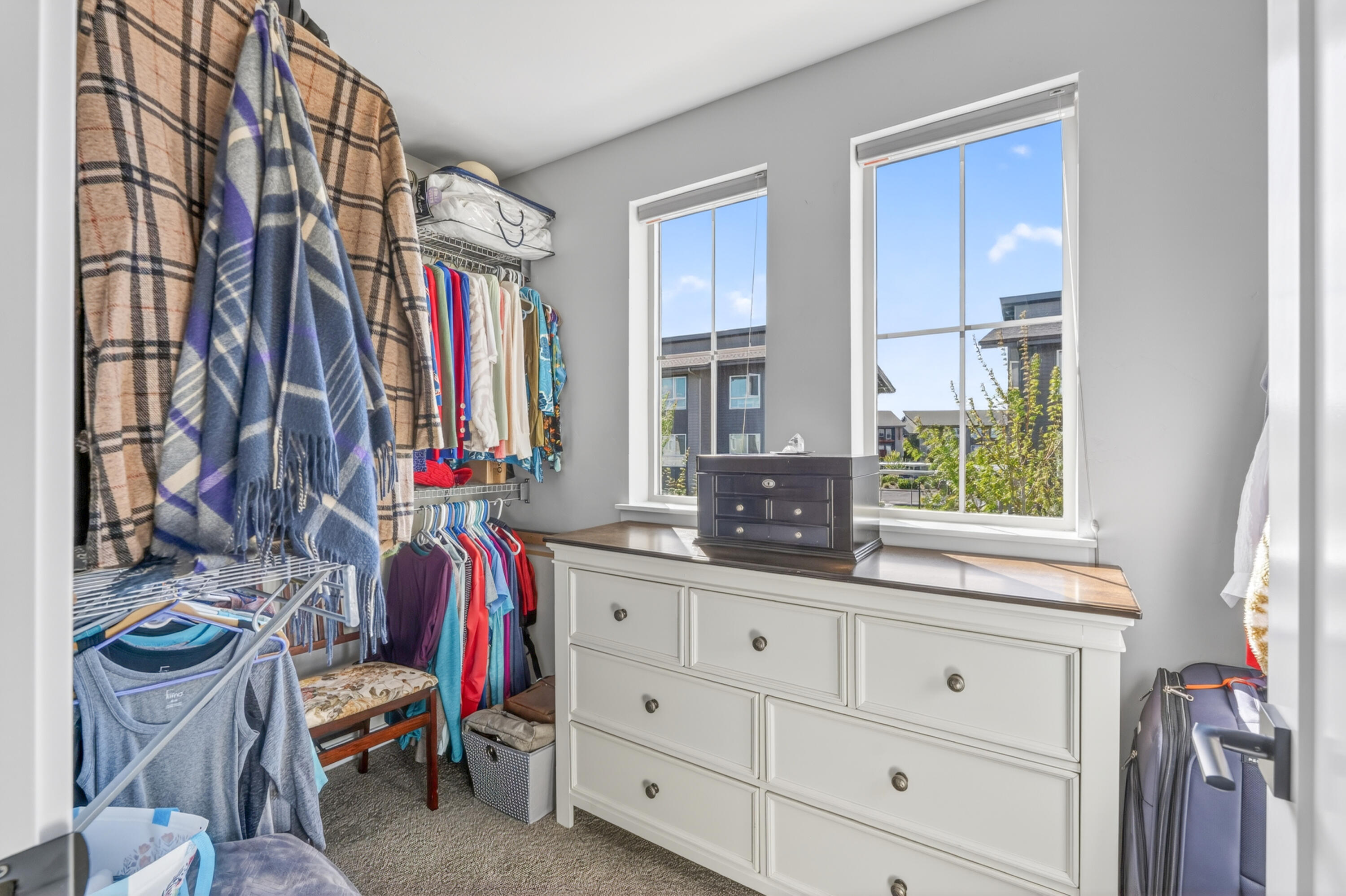 4572 Southwest 37th Street Redmond, OR 97756 - Photo 10 of 19 a view of walk in closet with clothes and shoes