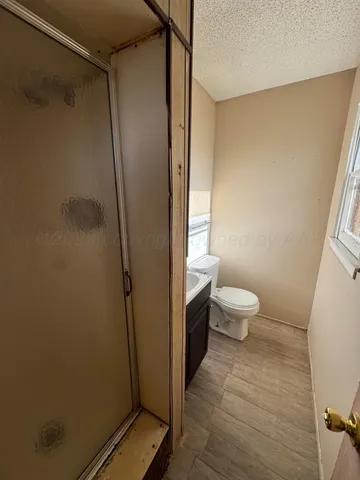 a view of a backyard of the house