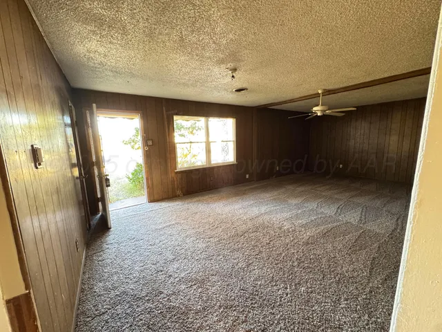 a kitchen with stainless steel appliances granite countertop a sink stove and granite counter tops