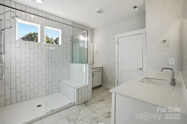 a room with lots of wooden cabinets
