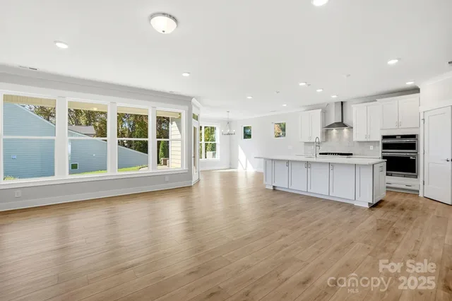 a view of kitchen with wooden floor