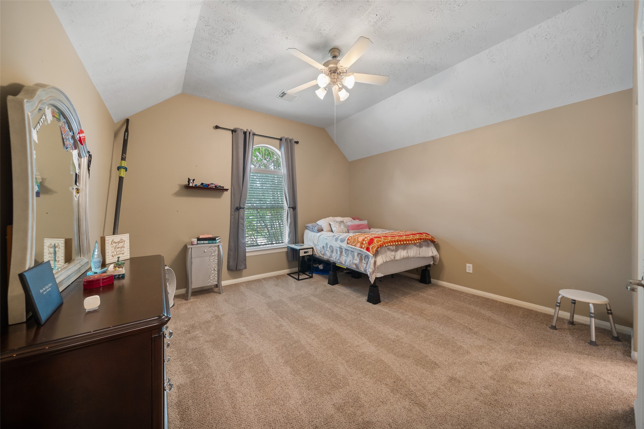 6407 Ashley Manor Drive Spring, TX 77389 - Photo 27 of 41 a bedroom with bed and window