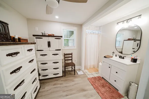 a kitchen with stainless steel appliances a stove a sink and a refrigerator