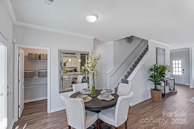a view of a livingroom with furniture and wooden floor