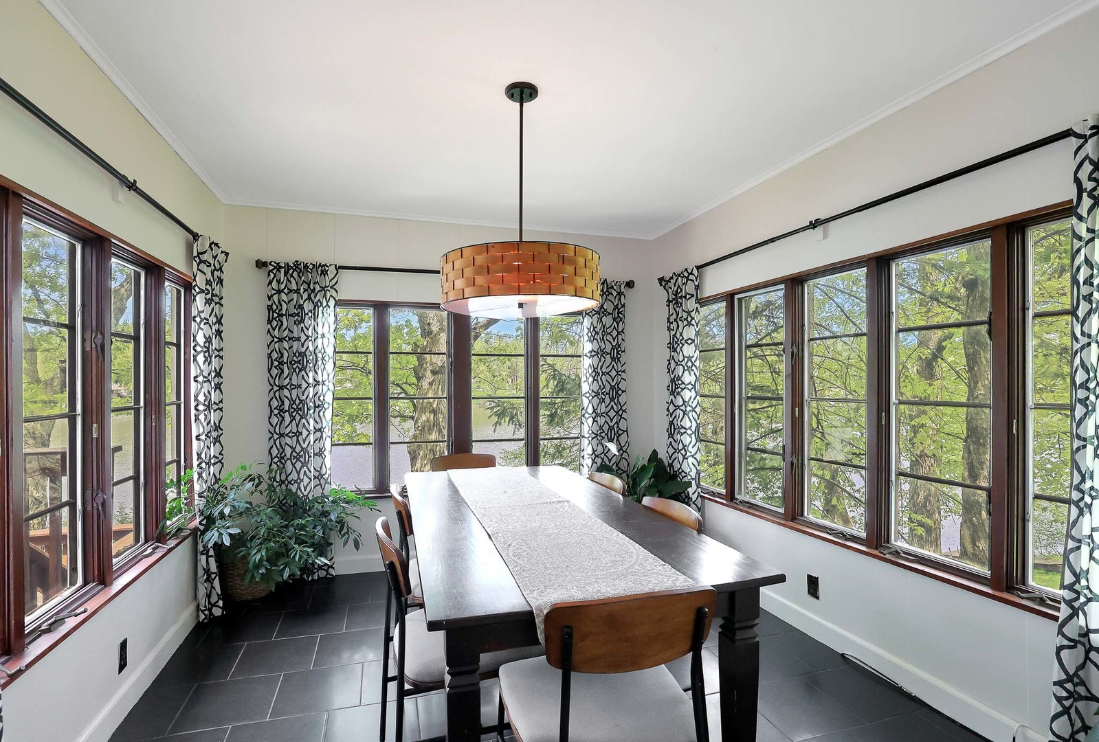 244 Indian Trail Lake In The Hills, IL 60156 - Photo 11 of 52 a view of a dining room with furniture window and wooden floor