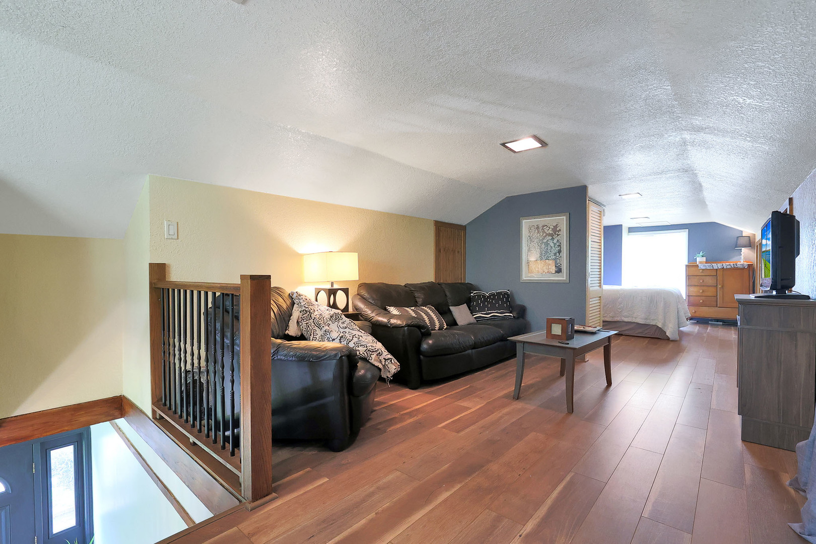 244 Indian Trail Lake In The Hills, IL 60156 - Photo 24 of 52 a living room with furniture and a wooden floor