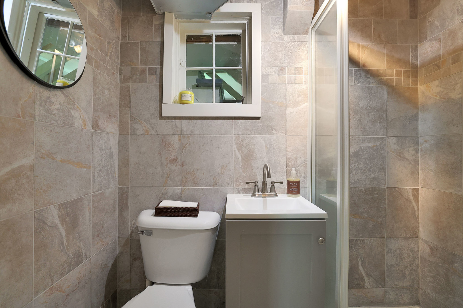 244 Indian Trail Lake In The Hills, IL 60156 - Photo 32 of 52 a bathroom with a toilet a sink and a mirror