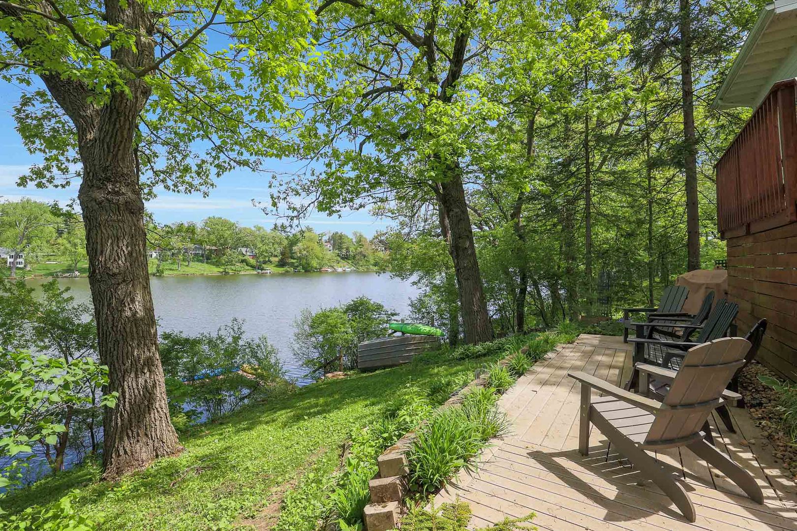 244 Indian Trail Lake In The Hills, IL 60156 - Photo 38 of 52 a view of a backyard with plants and lake view