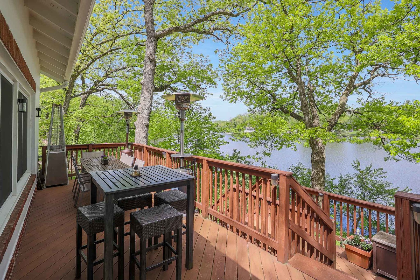 244 Indian Trail Lake In The Hills, IL 60156 - Photo 40 of 52 a view of balcony with furniture and trees