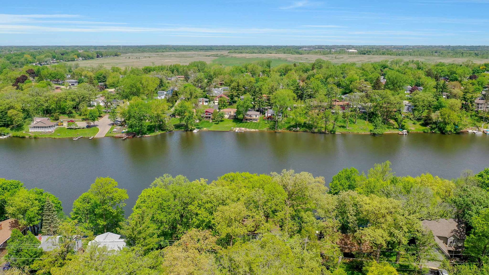 244 Indian Trail Lake In The Hills, IL 60156 - Photo 42 of 52 an aerial view of a houses with a lake view