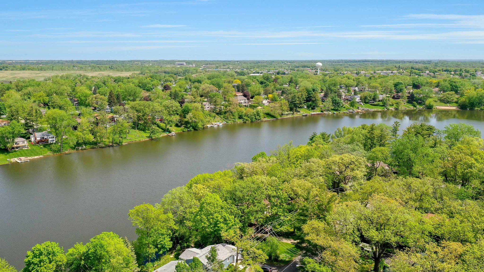 244 Indian Trail Lake In The Hills, IL 60156 - Photo 44 of 52 a view of a lake with a city