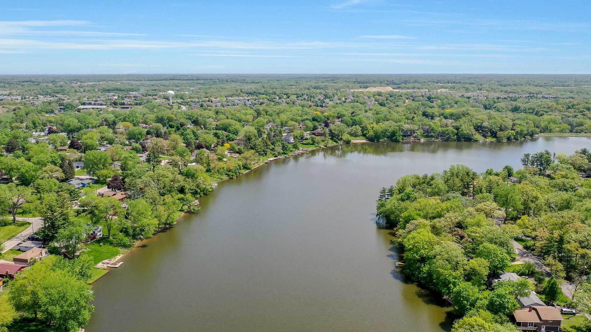 244 Indian Trail Lake In The Hills, IL 60156 - Photo 45 of 52 a view of a green field with an ocean view