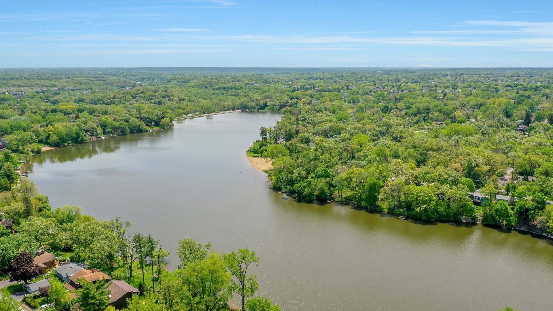 244 Indian Trail Lake In The Hills, IL 60156 - Photo 46 of 52 a view of a lake with a city