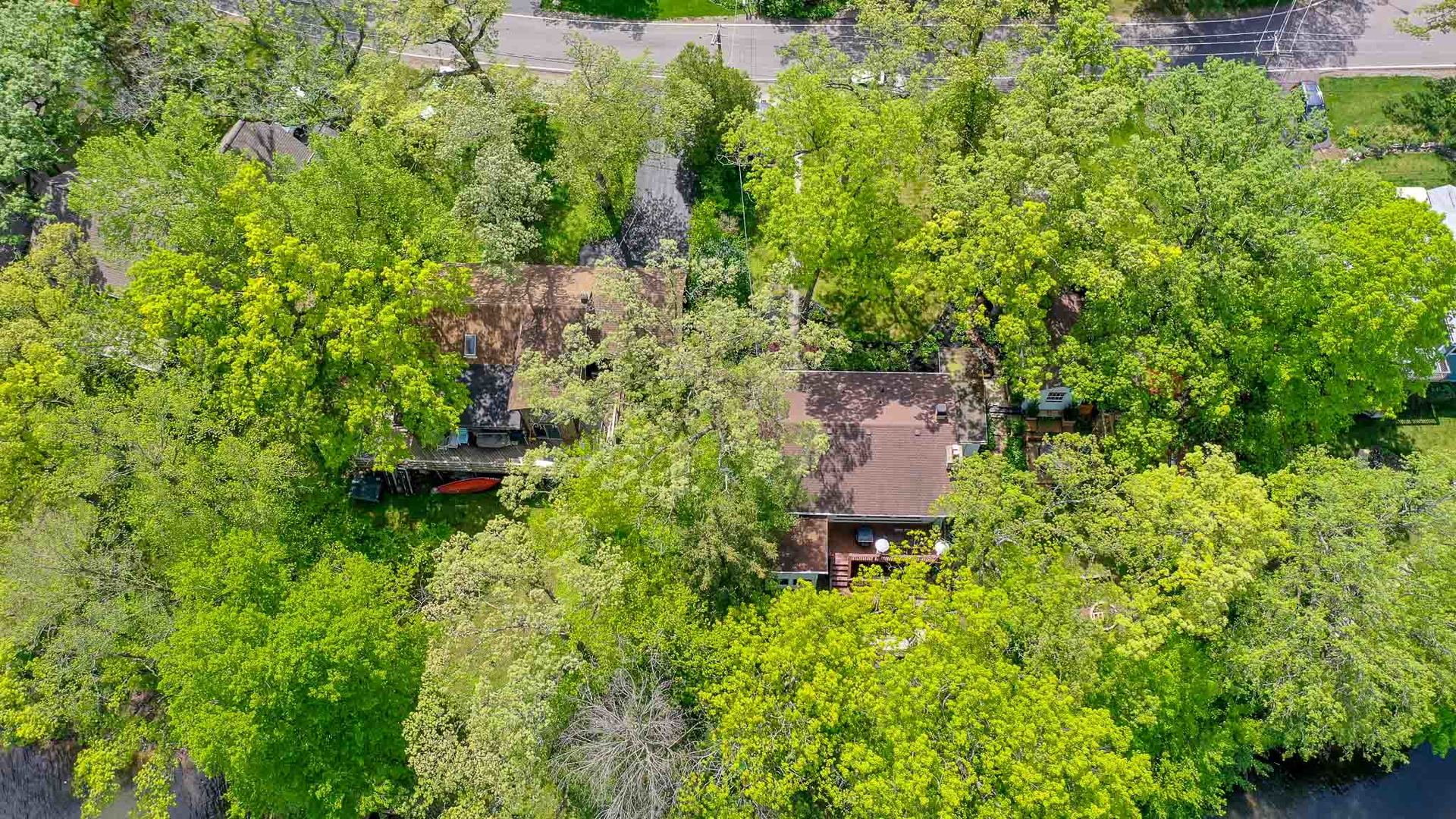 244 Indian Trail Lake In The Hills, IL 60156 - Photo 48 of 52 an aerial view of a house with a yard