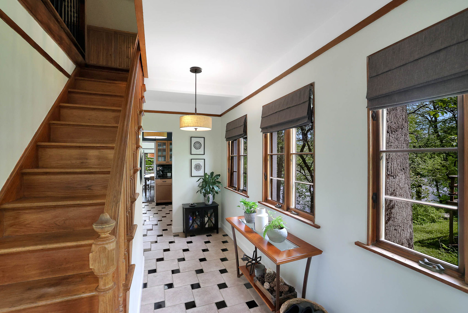 244 Indian Trail Lake In The Hills, IL 60156 - Photo 6 of 52 a view of a hallway with wooden floor and windows