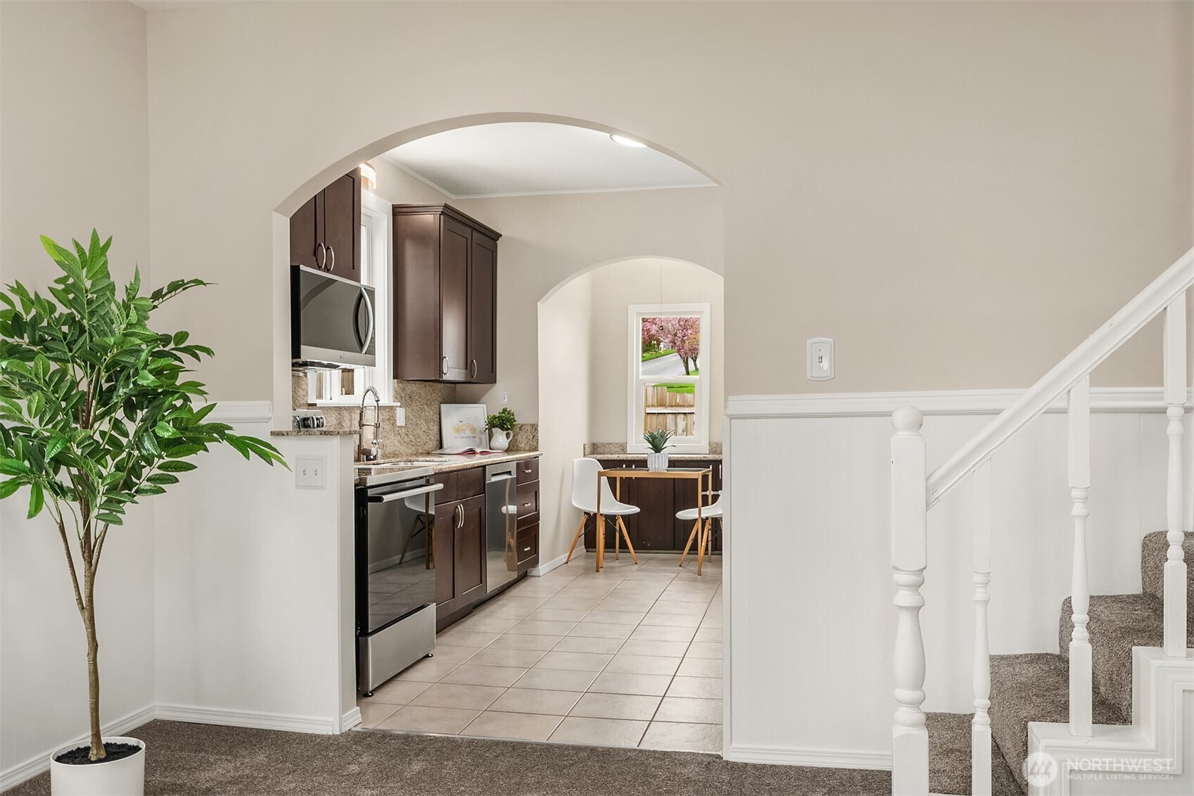 1532 Maple Street Everett, WA 98201 - Photo 11 of 39 a living room with furniture potted plant and a window