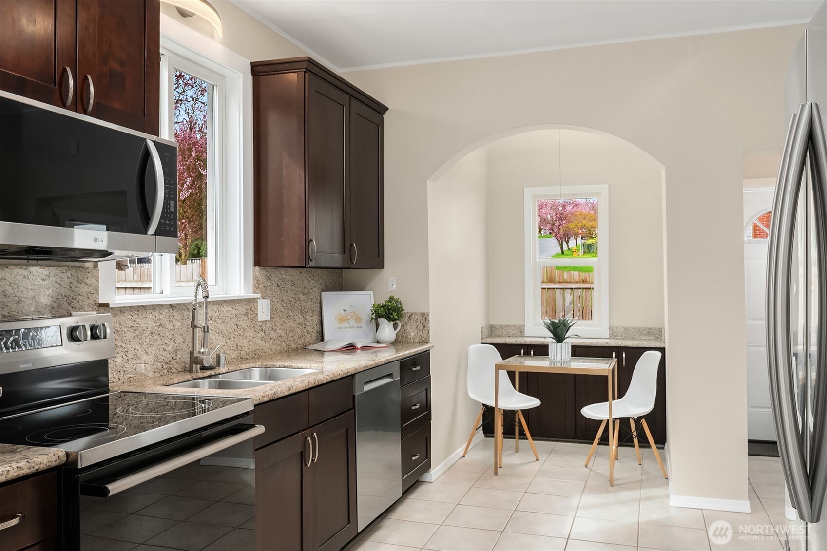 1532 Maple Street Everett, WA 98201 - Photo 12 of 39 a kitchen with a sink cabinets and window