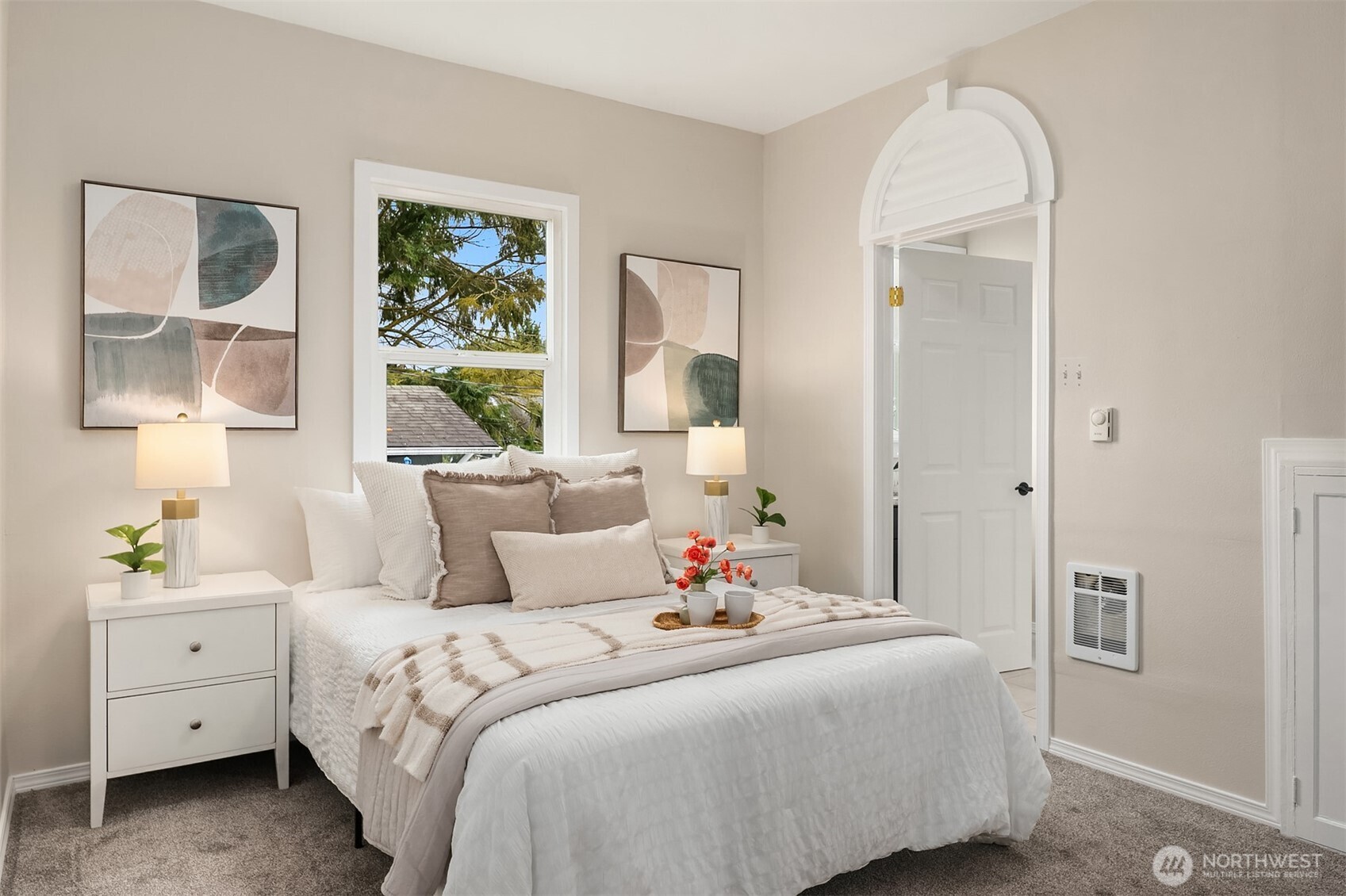 1532 Maple Street Everett, WA 98201 - Photo 17 of 39 a bedroom with a large bed and a window