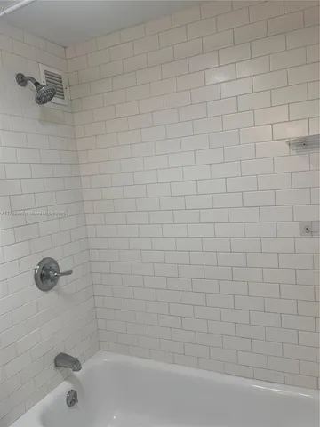 a view of a room with rack on the wall